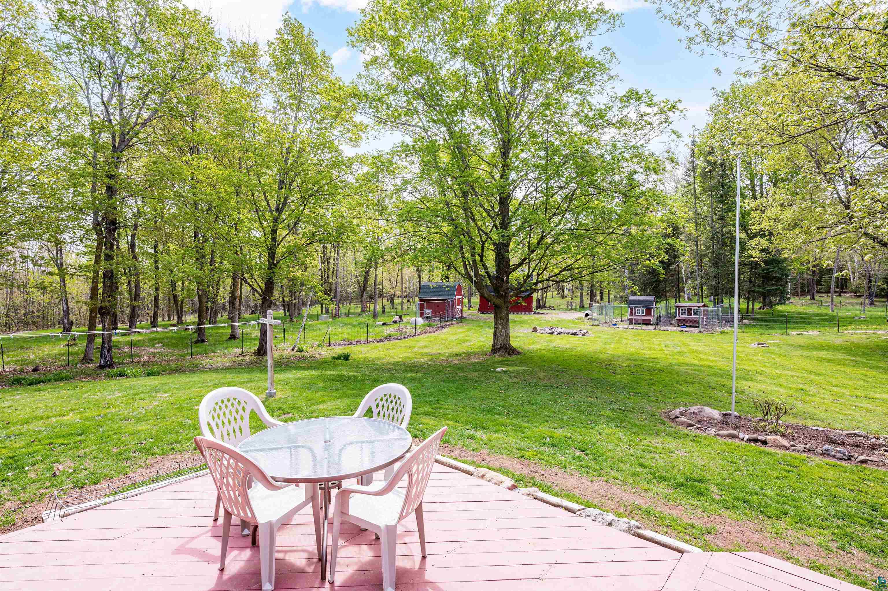 Deck featuring a lawn