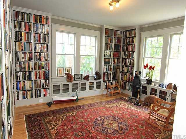 The 1st Floor Library has built In Shelves, Hardwood Floors and Garden Views. Library