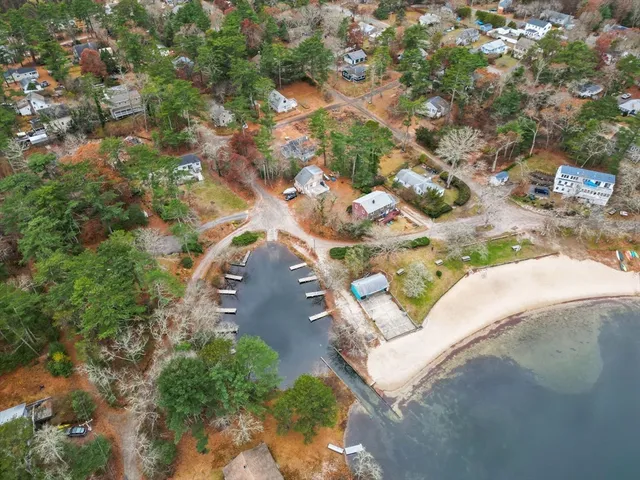 a view of a house with a large window and stairs