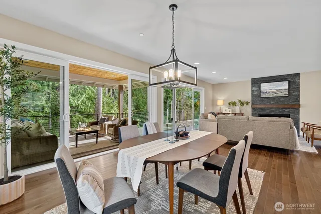 a dining room with furniture window wooden floor