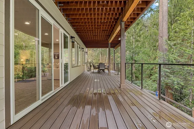 a view of balcony with wooden floor