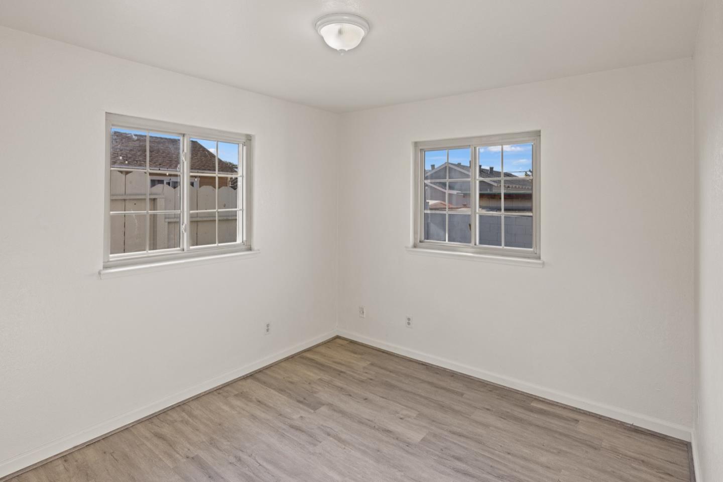 1693 Goodwin Street Seaside, CA 93955 - Photo 21 of 43 a view of empty room with windows