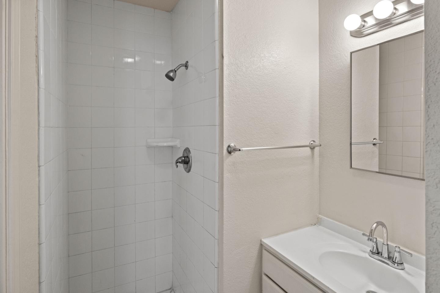 1693 Goodwin Street Seaside, CA 93955 - Photo 25 of 43 a bathroom with a sink toilet and shower