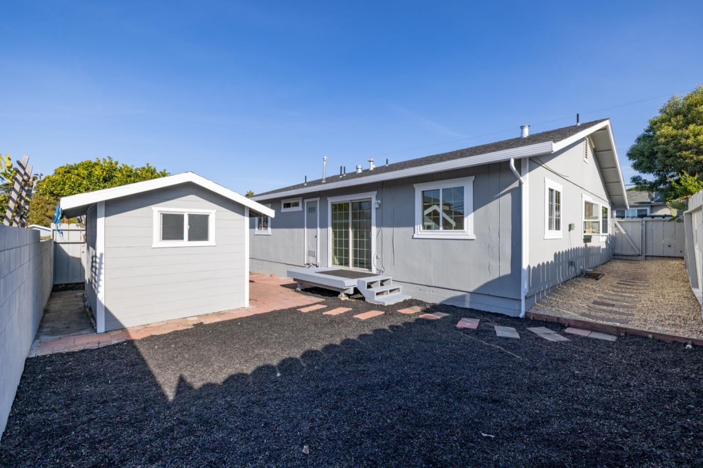 1693 Goodwin Street Seaside, CA 93955 - Photo 34 of 43 a view of a house with a backyard