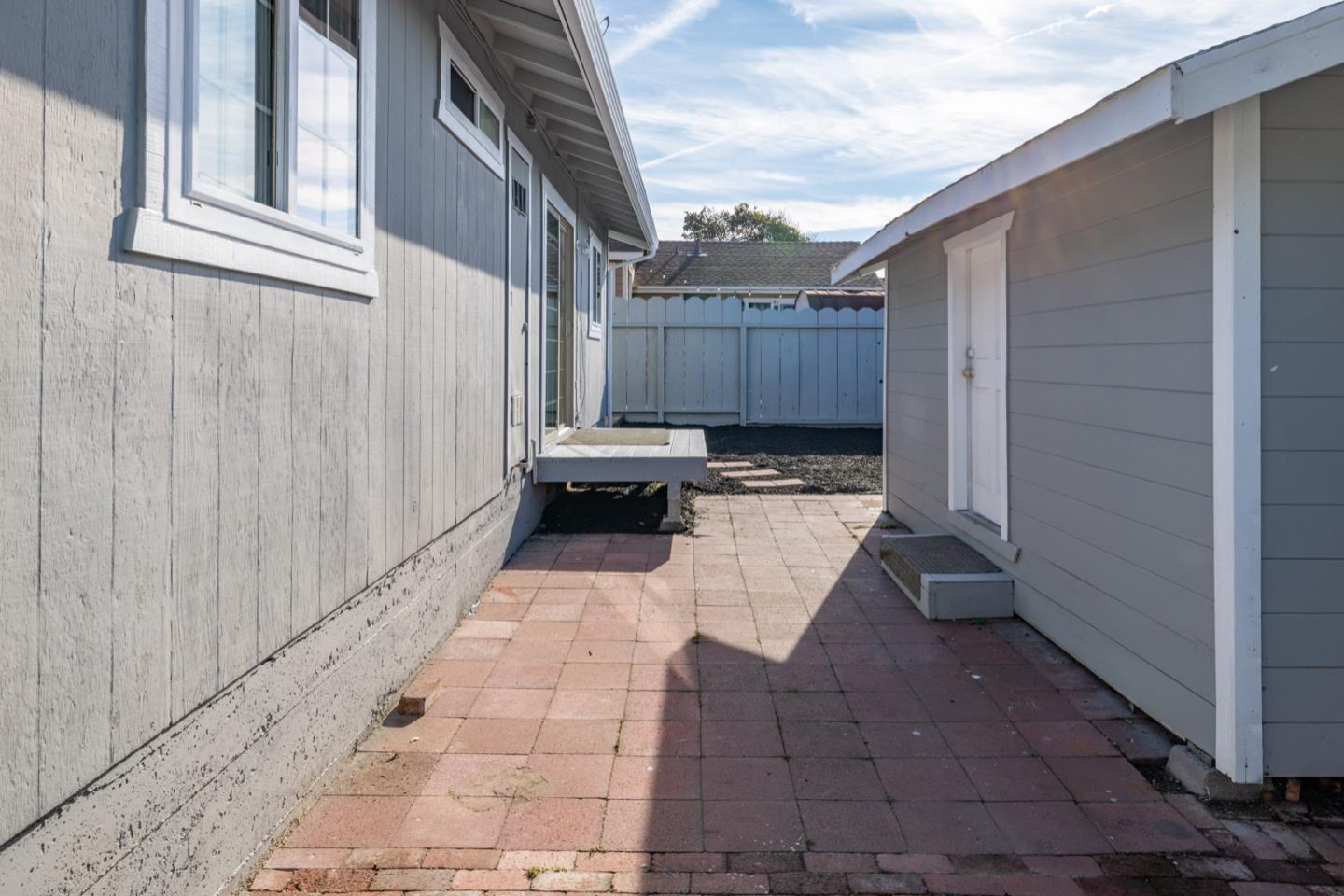 1693 Goodwin Street Seaside, CA 93955 - Photo 37 of 43 a view of a back yard with sitting area