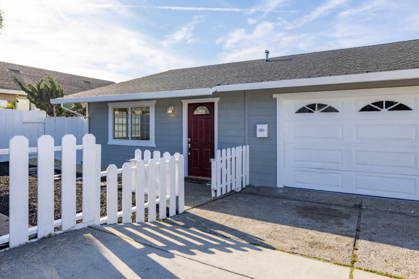 1693 Goodwin Street Seaside, CA 93955 - Photo 4 of 43 a view of a house with wooden fence