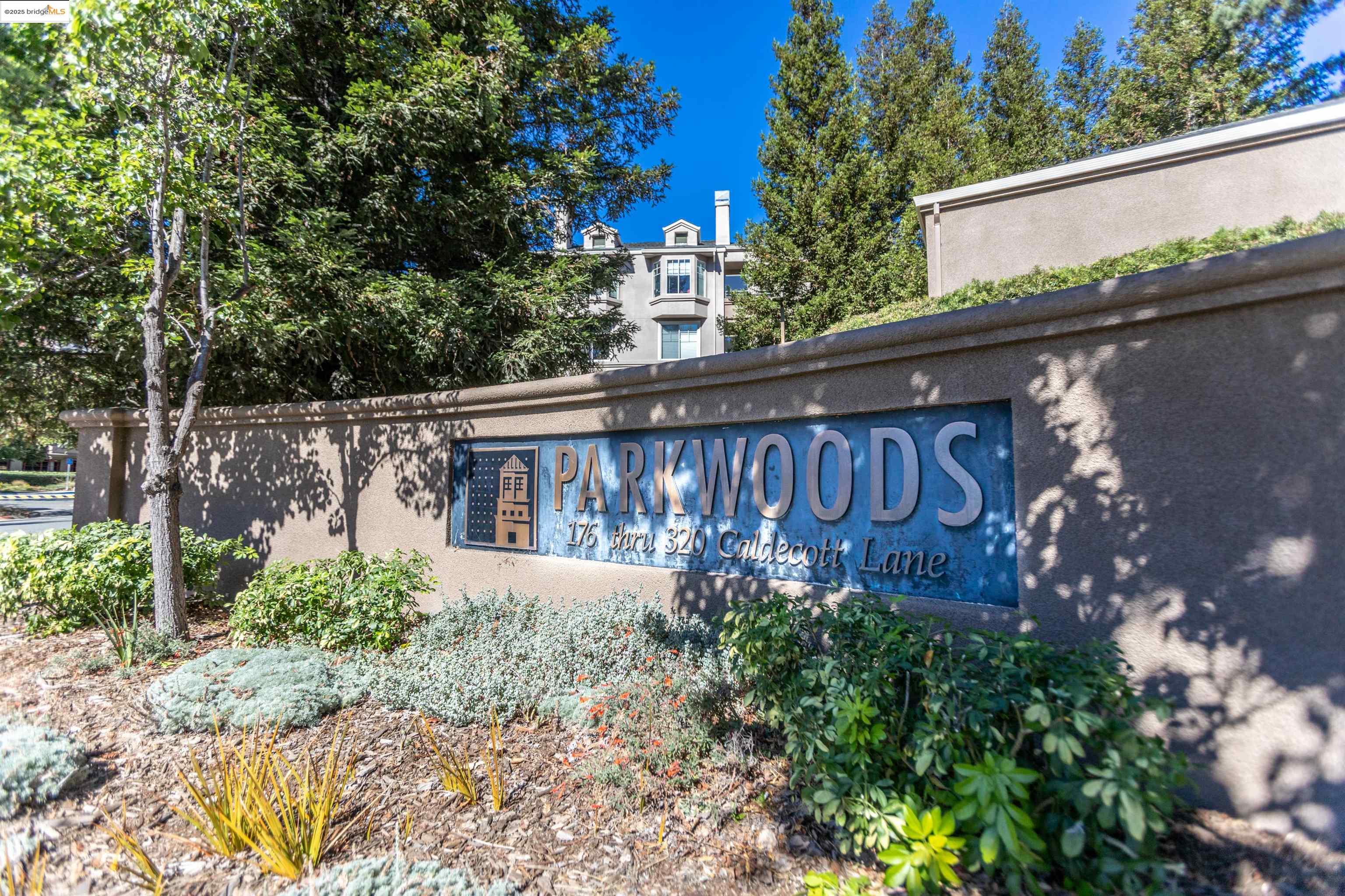 280 Caldecott Lane, Unit 311 Oakland, CA 94618 - Photo 2 of 6 a view of a house with a yard