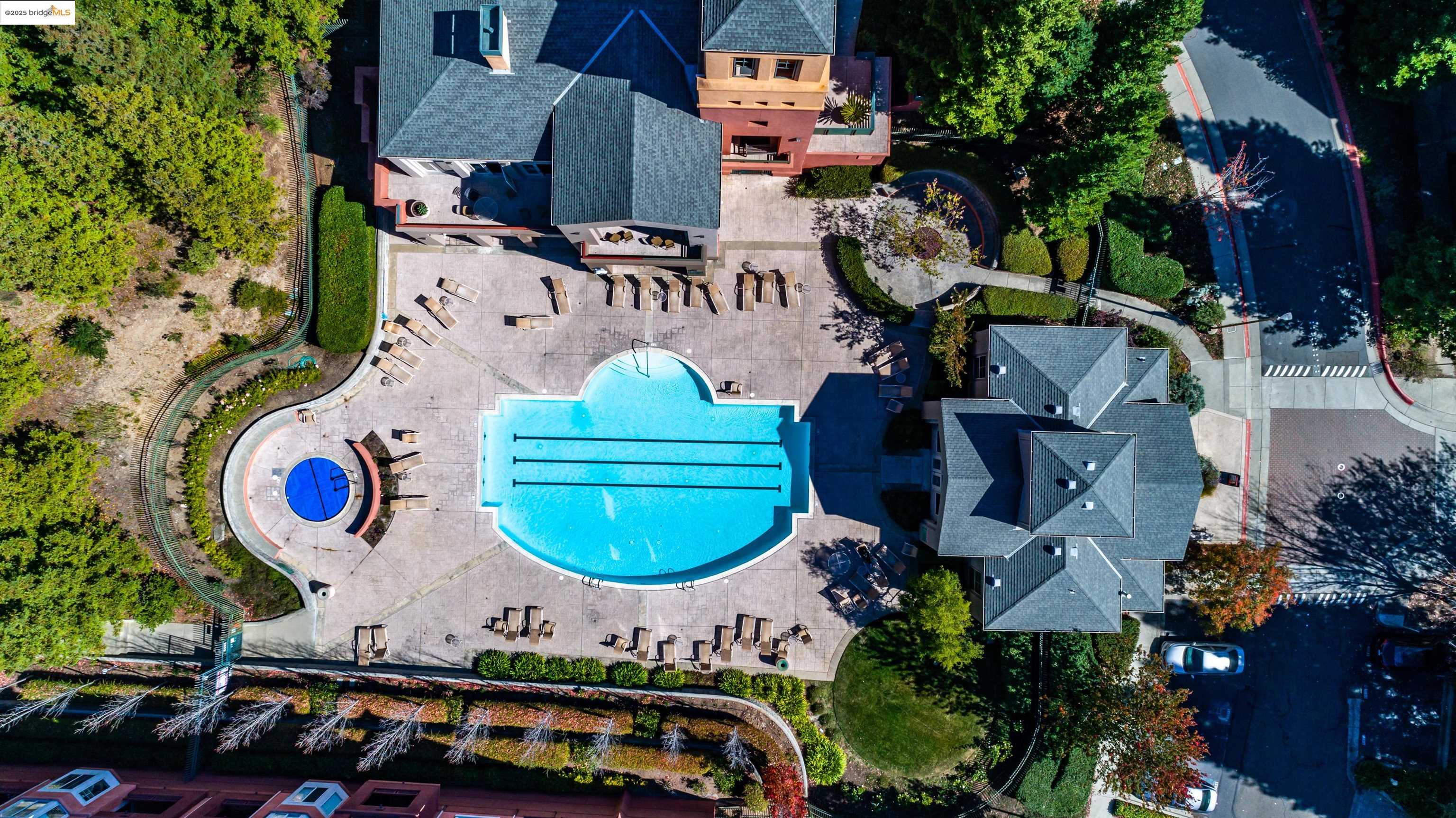 280 Caldecott Lane, Unit 311 Oakland, CA 94618 - Photo 4 of 6 an aerial view of a house with garden space and street view