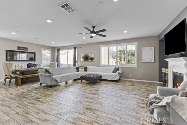 23347 Crystal Way Wildomar, CA 92595 - Photo 1 of 29 a living room with fireplace furniture and a flat screen tv
