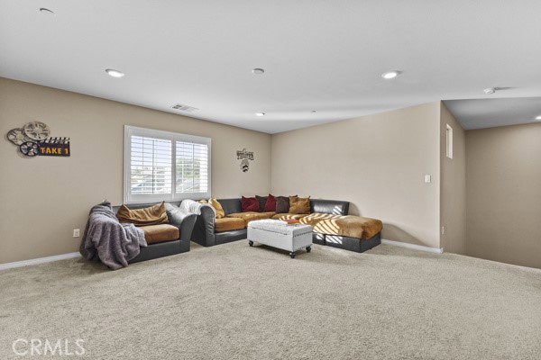 23347 Crystal Way Wildomar, CA 92595 - Photo 15 of 29 a living room with furniture a window and a couch