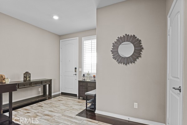 23347 Crystal Way Wildomar, CA 92595 - Photo 2 of 32 a view of a room with wooden floor and bathroom