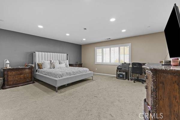 23347 Crystal Way Wildomar, CA 92595 - Photo 20 of 29 a bedroom with a bed and a flat screen tv
