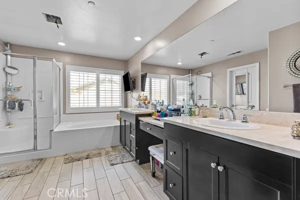 a kitchen with sink stove and refrigerator