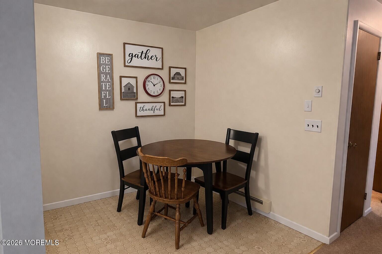 3 Quaker Lane, Unit D Whiting, NJ 08759 - Photo 5 of 9 a view of a table and chairs in a room