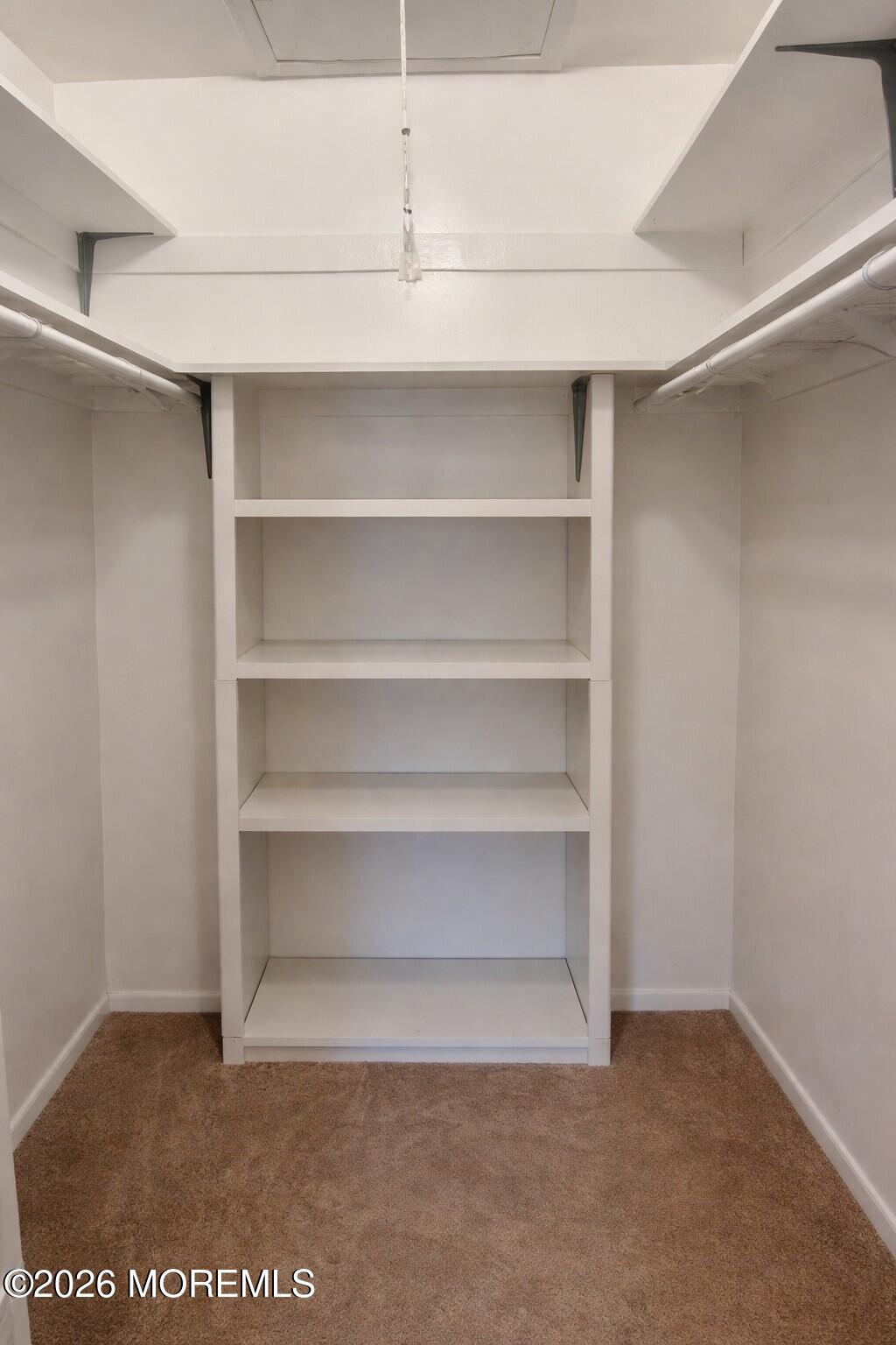 3 Quaker Lane, Unit D Whiting, NJ 08759 - Photo 8 of 9 a view of room and empty racks