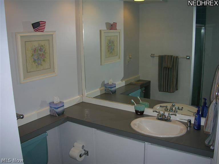 362 Nobottom Road Berea, OH 44017 - Photo 14 of 18 Bathroom #2 is huge for a Berea ranch home. The bath has a nice shower stall and plenty of storage. Brand new ceramic tile floor, beautiful!