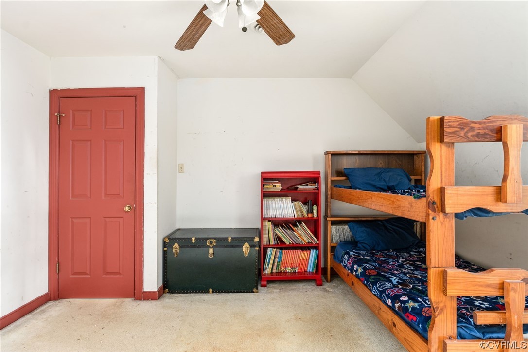 18910 Duval Road Moseley, VA 23120 - Photo 22 of 26 an entryway with a bed and a dresser