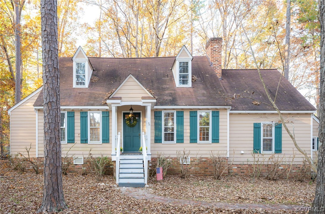 18910 Duval Road Moseley, VA 23120 - Photo 3 of 26 a front view of a house with a yard