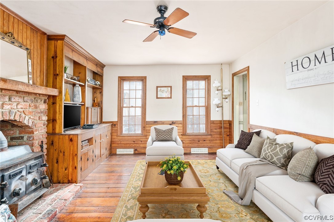 18910 Duval Road Moseley, VA 23120 - Photo 5 of 26 a living room with furniture fireplace and a large window