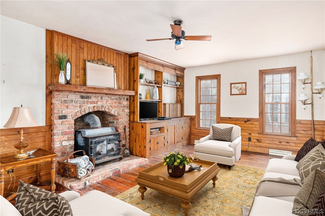 18910 Duval Road Moseley, VA 23120 - Photo 6 of 26 a living room with furniture fireplace and a table