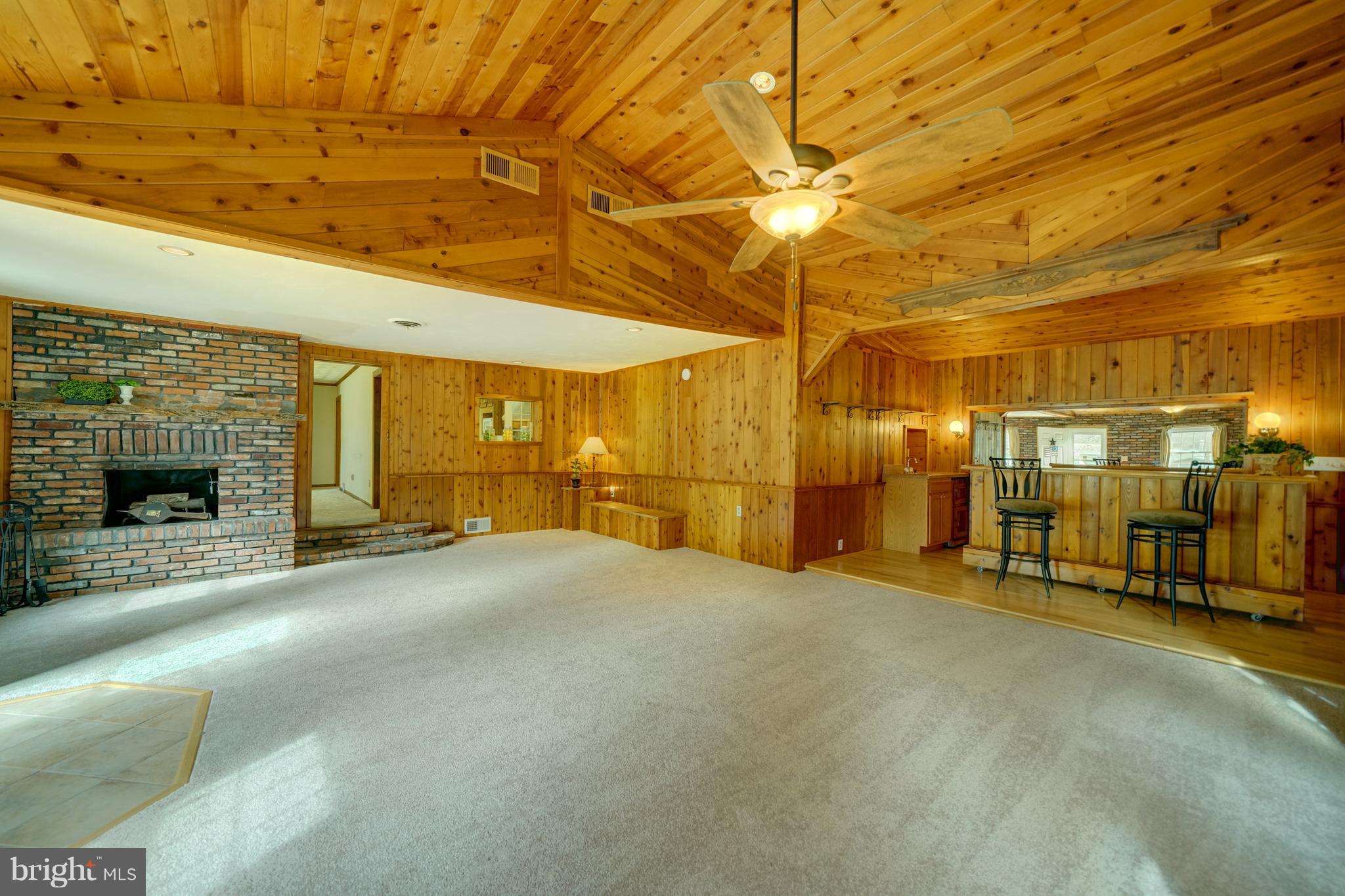 241 Burns Crossing Road Severn, MD 21144 - Photo 1 of 30 a view of an empty room with a fireplace