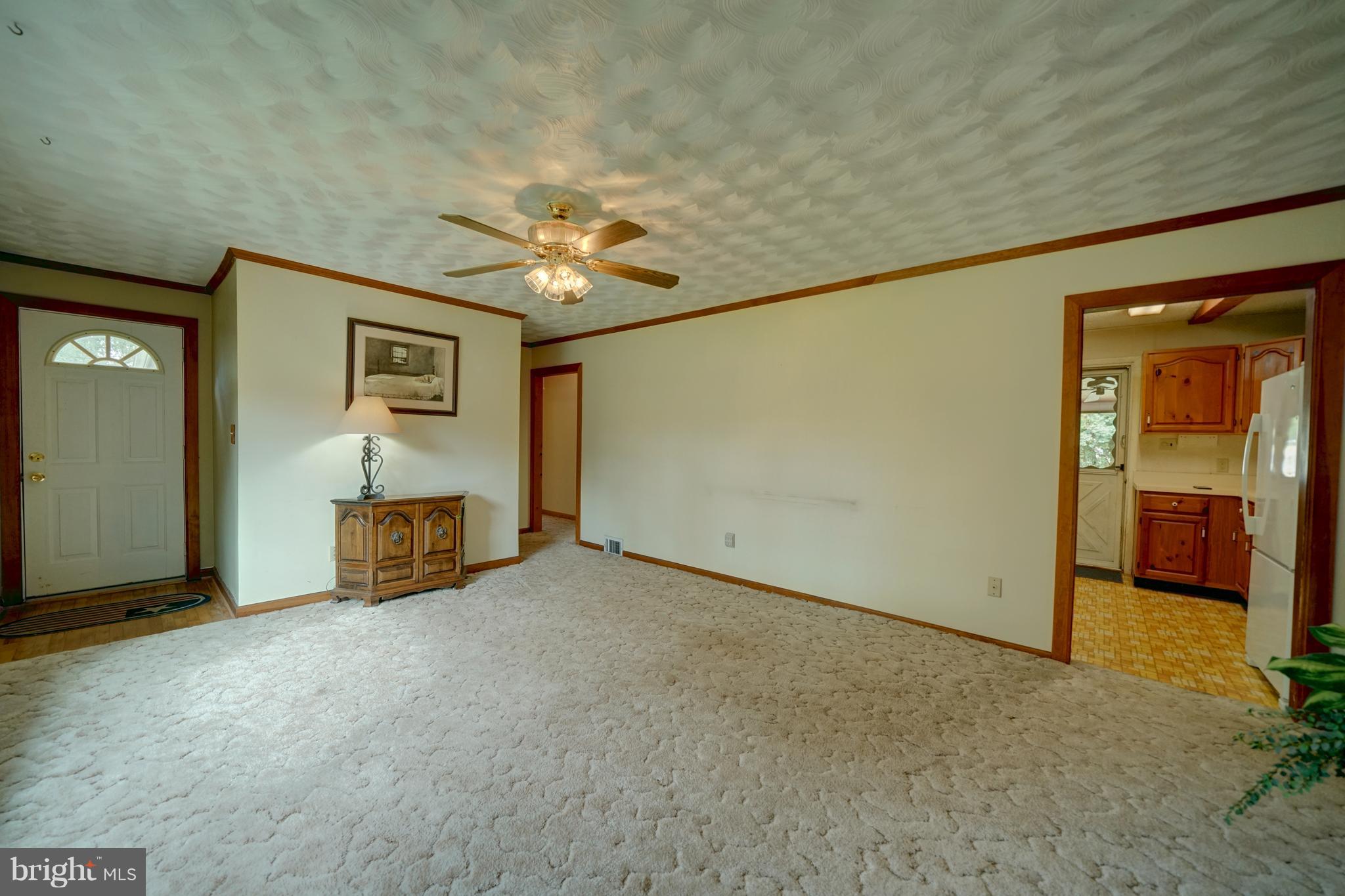 241 Burns Crossing Road Severn, MD 21144 - Photo 11 of 30 an empty room with windows