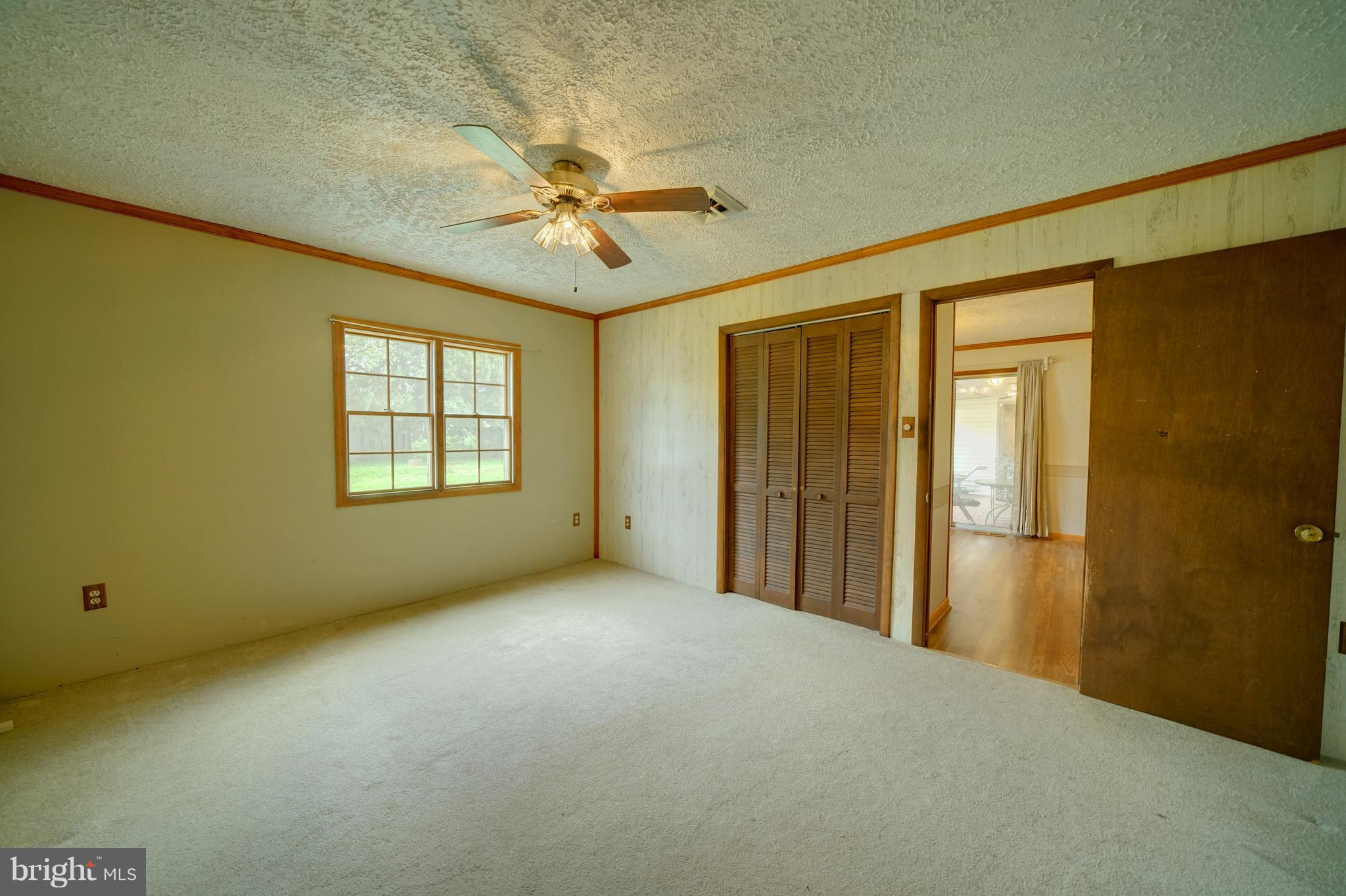 241 Burns Crossing Road Severn, MD 21144 - Photo 17 of 30 a view of an empty room with a window
