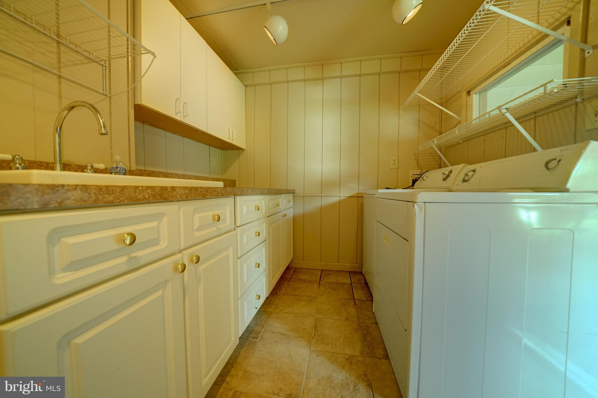 241 Burns Crossing Road Severn, MD 21144 - Photo 27 of 30 a utility room with dryer and washer