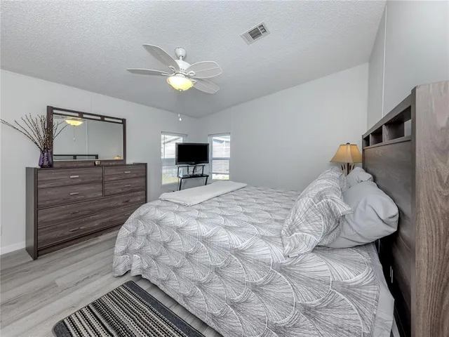 a outdoor living space with furniture and a floor to ceiling window