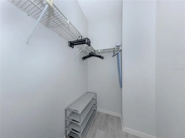 a room with furniture and a large window