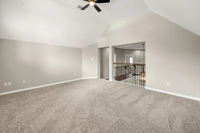 a view of a livingroom with a kitchen and a dishwasher