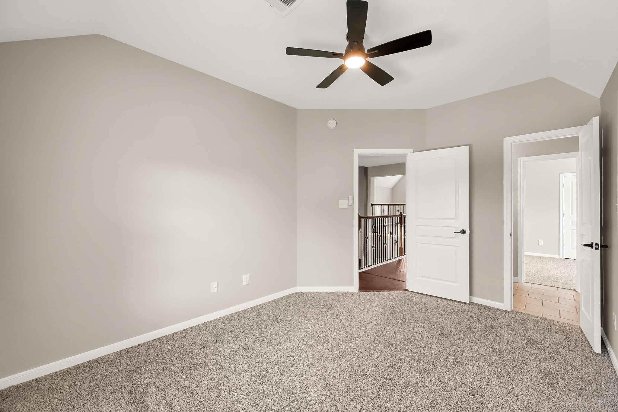 2425 West Bramlet Drive Conroe, TX 77304 - Photo 20 of 31 an empty room with closet and windows
