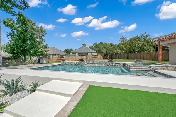 a view of a house with a big yard