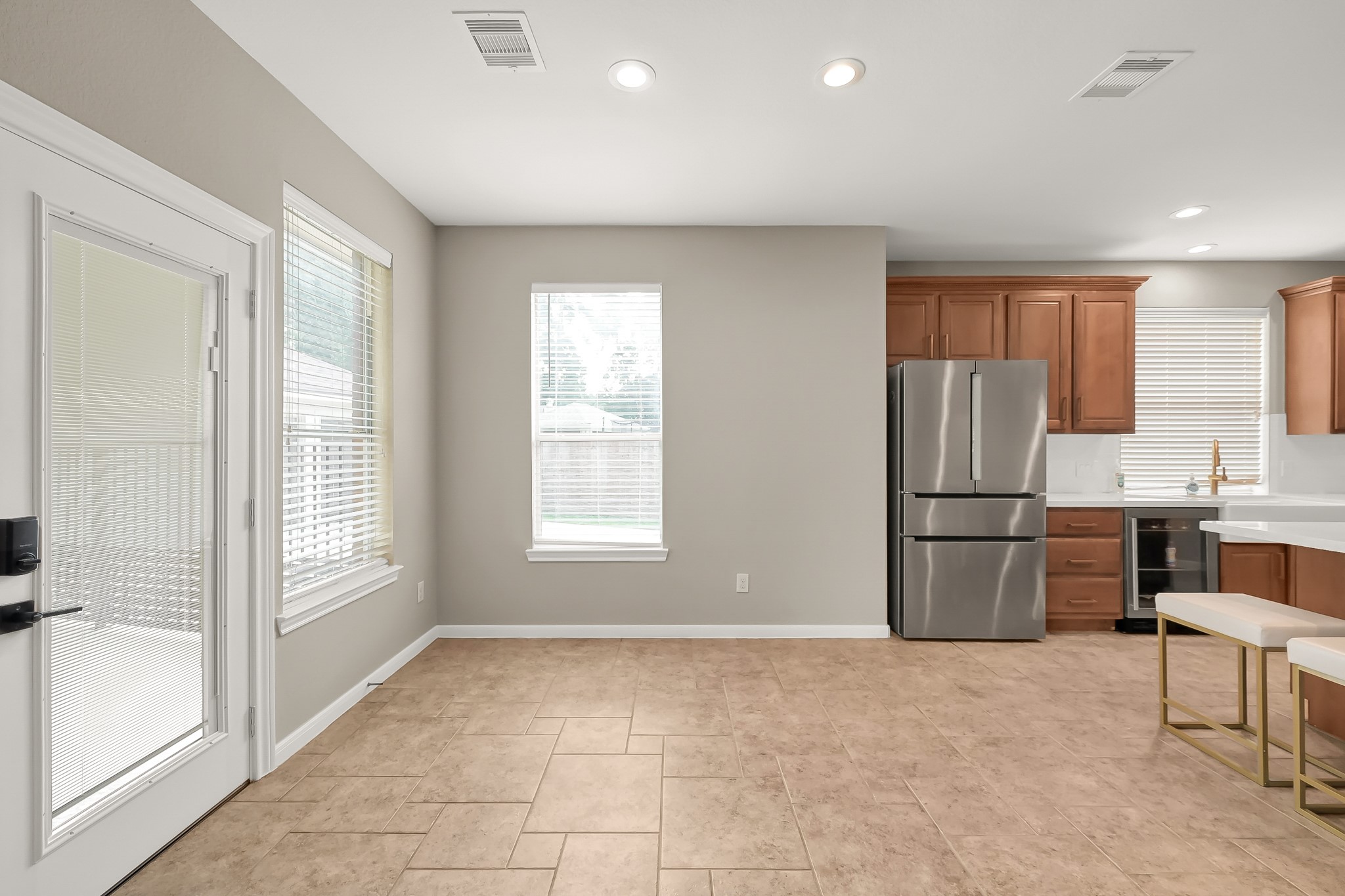 2425 West Bramlet Drive Conroe, TX 77304 - Photo 7 of 31 a view of kitchen with refrigerator and oven