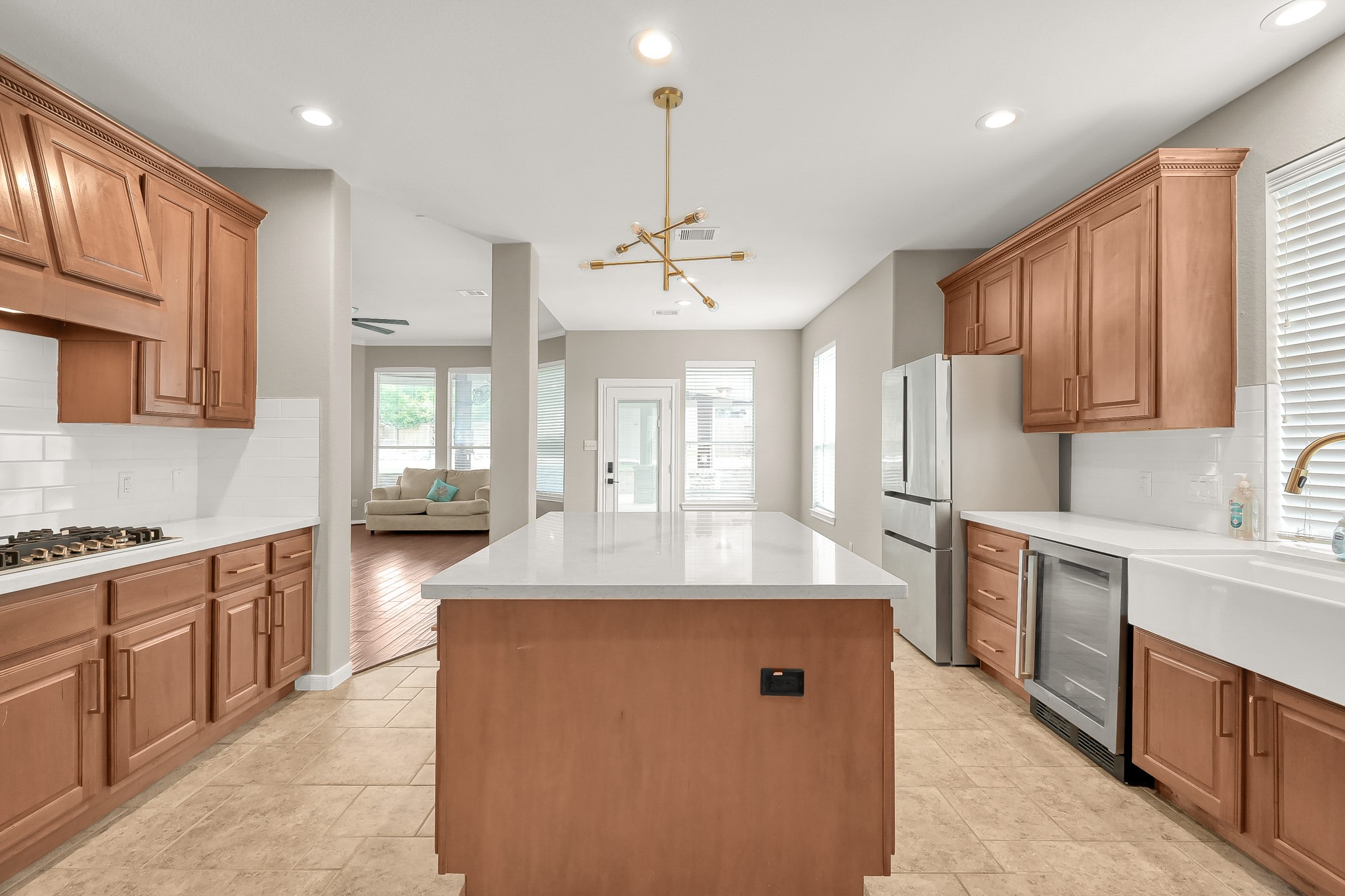 2425 West Bramlet Drive Conroe, TX 77304 - Photo 9 of 31 a kitchen with stainless steel appliances granite countertop a sink stove and refrigerator