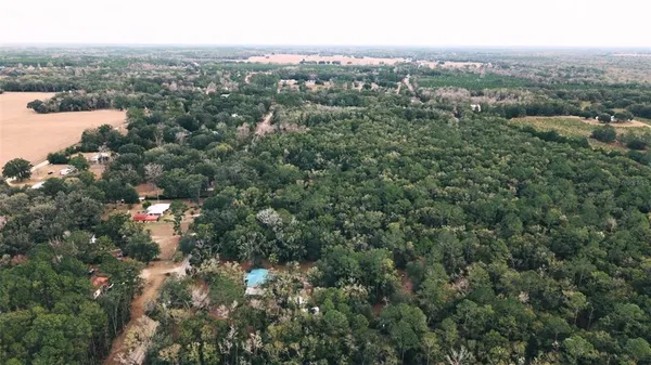 an aerial view of a city with lots of residential buildings