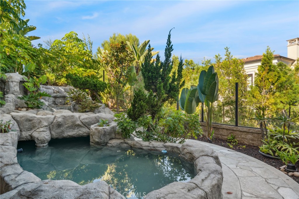 111 Whiteplume Irvine, CA 92618 - Photo 23 of 66 a view of a water pond with green space