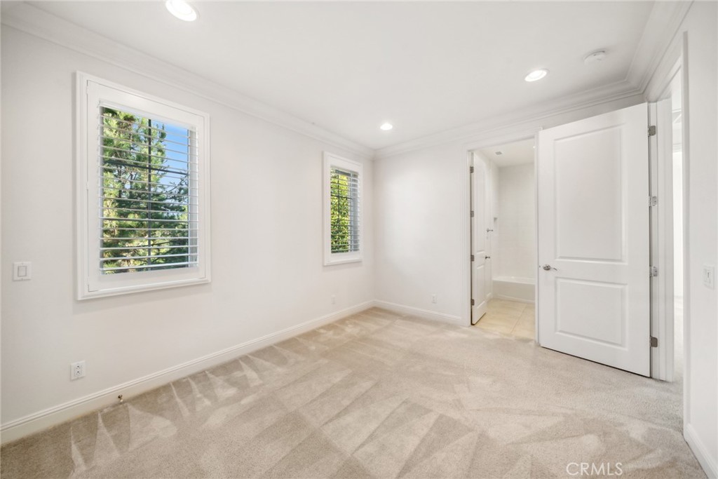 111 Whiteplume Irvine, CA 92618 - Photo 42 of 66 an empty room with windows and closet