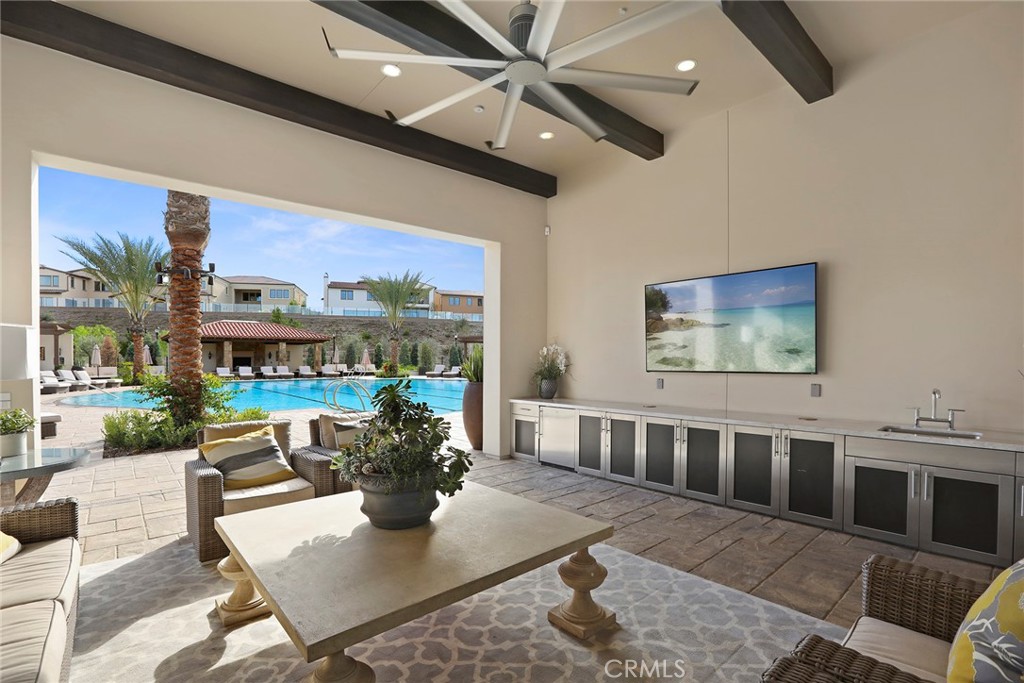 111 Whiteplume Irvine, CA 92618 - Photo 58 of 66 a living room with furniture and a flat screen tv