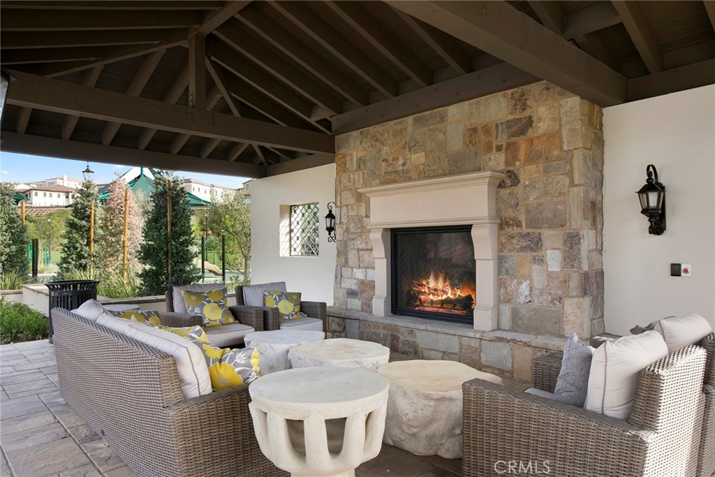 111 Whiteplume Irvine, CA 92618 - Photo 60 of 66 a living room with furniture and a fireplace