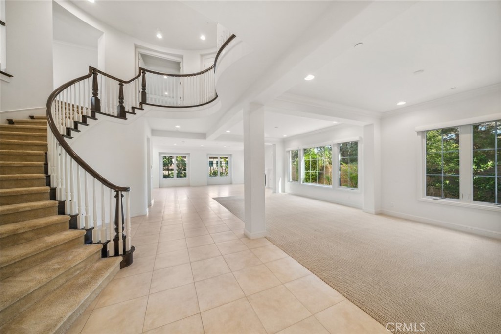 111 Whiteplume Irvine, CA 92618 - Photo 8 of 66 a view of an entryway with wooden floor