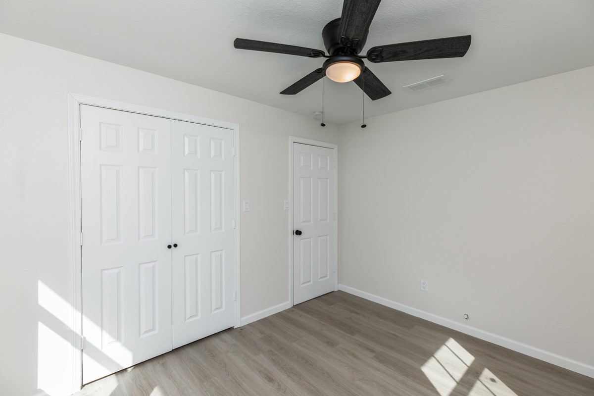 5260 Landry Lane Beaumont, TX 77708 - Photo 19 of 25 wooden floor in an empty room