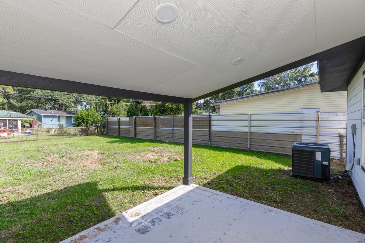 5260 Landry Lane Beaumont, TX 77708 - Photo 23 of 25 a view of a backyard with a garden