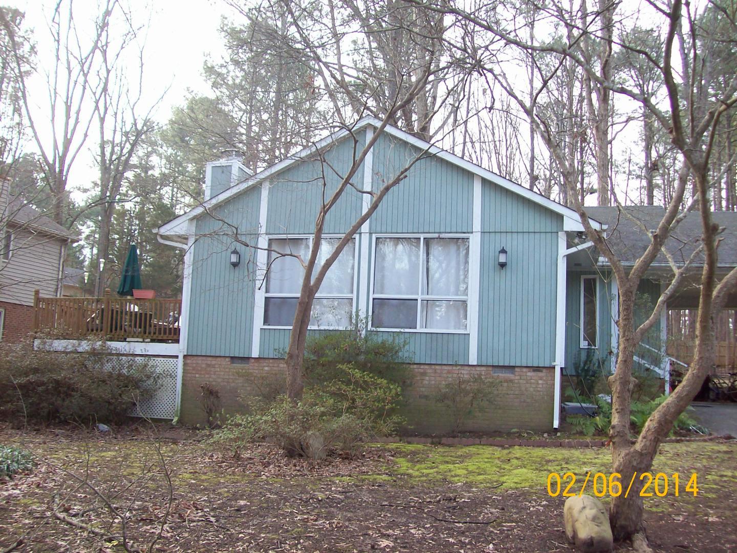 805 Castalia Drive Cary, NC 27513 - Photo 1 of 9 a view of a house with backyard