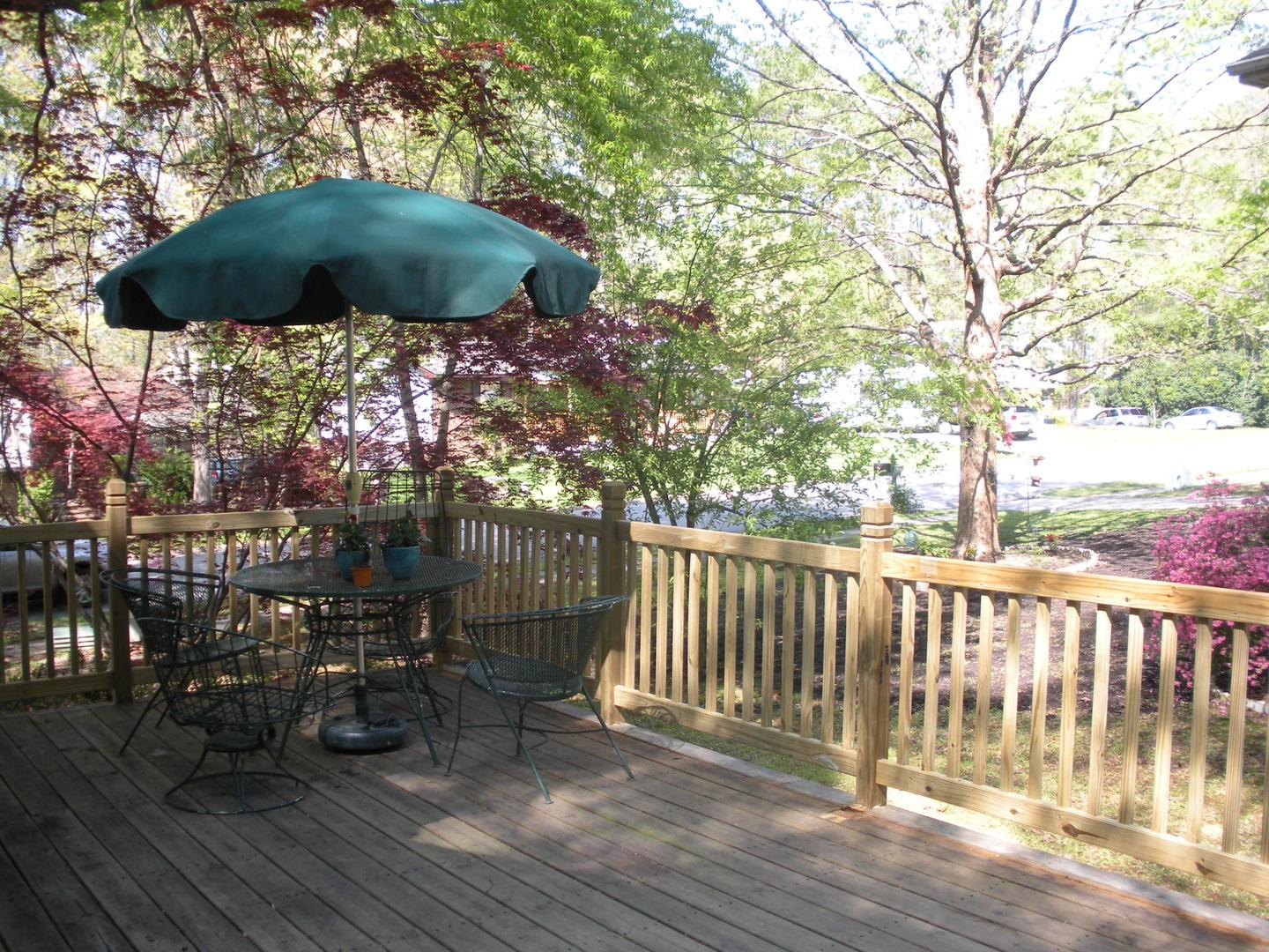 805 Castalia Drive Cary, NC 27513 - Photo 6 of 9 a view of a chairs and a umbrella