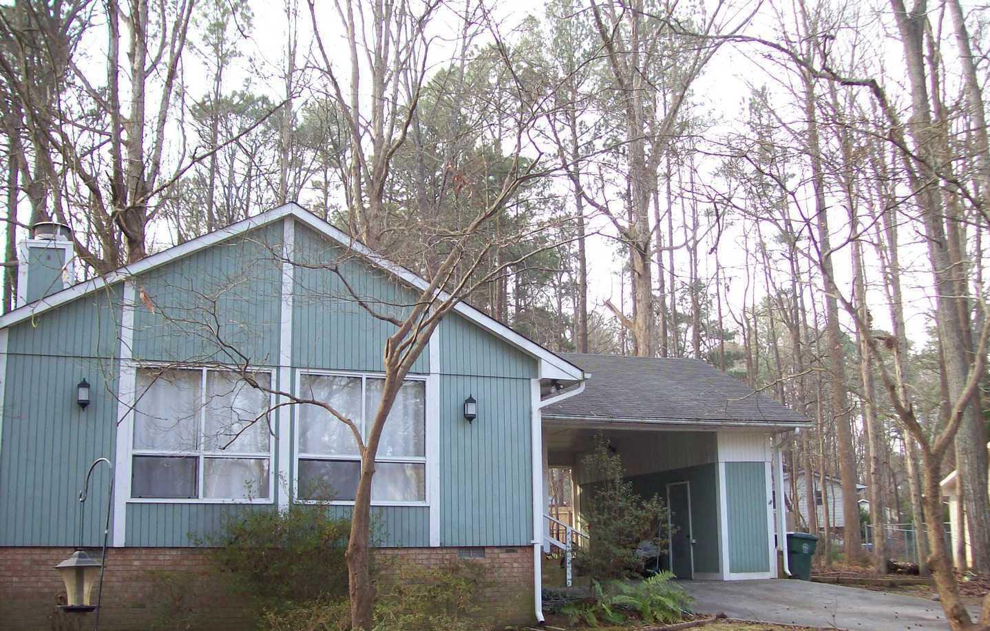 805 Castalia Drive Cary, NC 27513 - Photo 9 of 9 a house that has a tree in front of the house