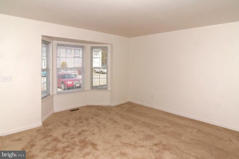 7204 Rutherford Green Circle Windsor Mill, MD 21244 - Photo 4 of 13 an empty room with window