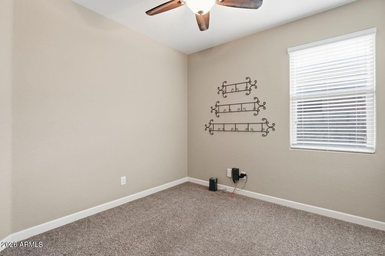 23602 West Ripple Road Buckeye, AZ 85326 - Photo 26 of 38 an empty room with a window