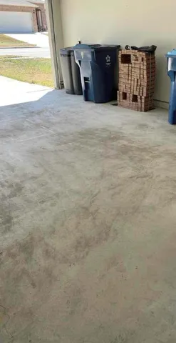 a view of a bedroom with wooden floor