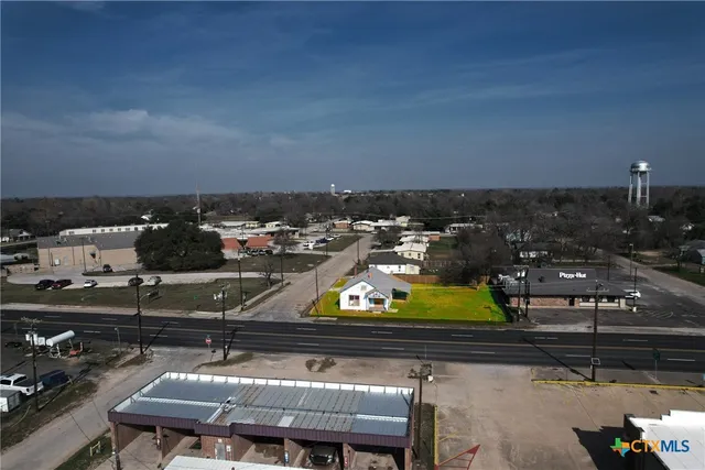 a view of a chairs and table in a terrace